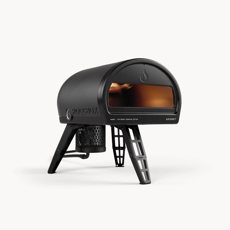 Gozney Roccbox Black with the supplied propane burner, front three-quarter view