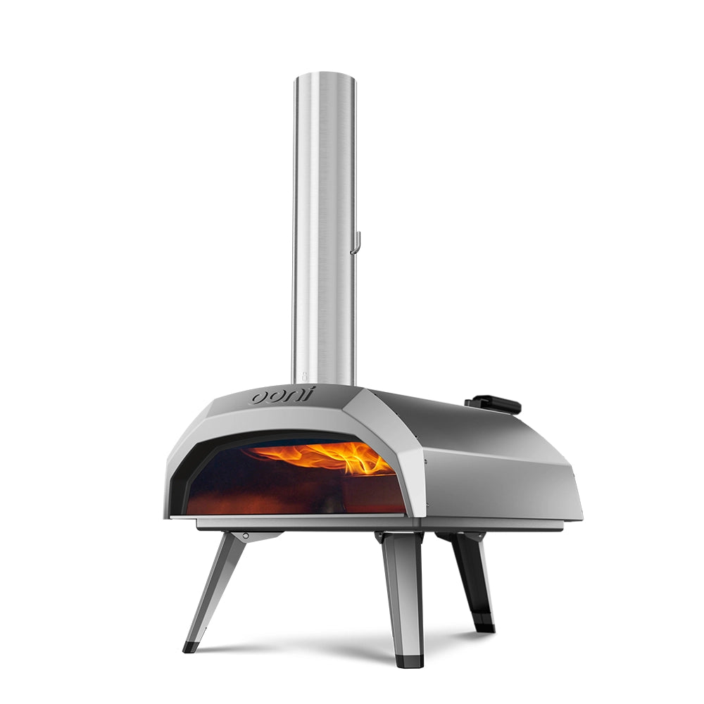 Ooni Karu 12 first-generation outdoor oven with stainless-steel body, door, chimney and folding legs