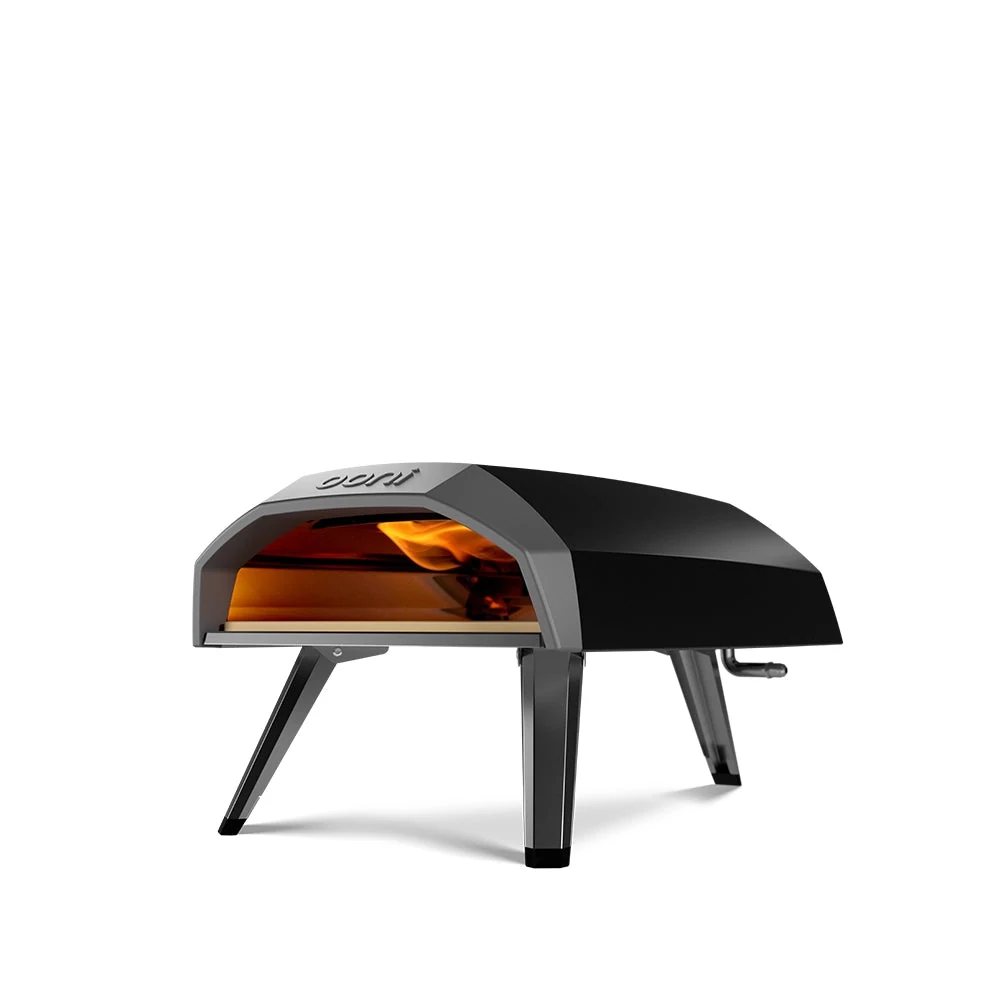 Ooni Koda 12 first-generation propane pizza oven, black body and cordierite stone, viewed from the front at a slight angle.