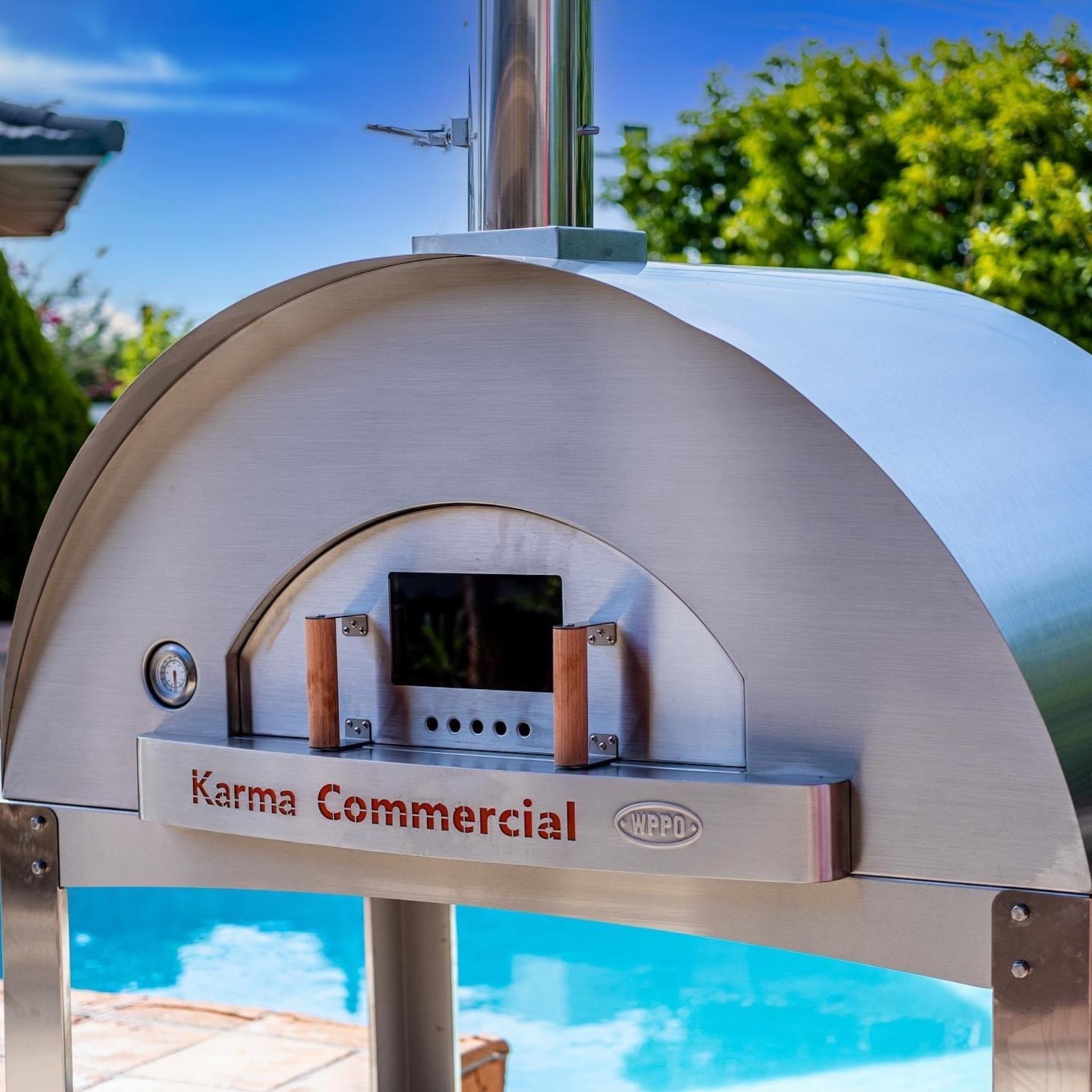 WPPO Karma 55 wood-fired oven showing its stainless body, chimney and front door